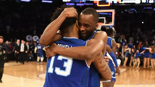 Myles Powell and Quincy McKnight Embrace after Marquette win