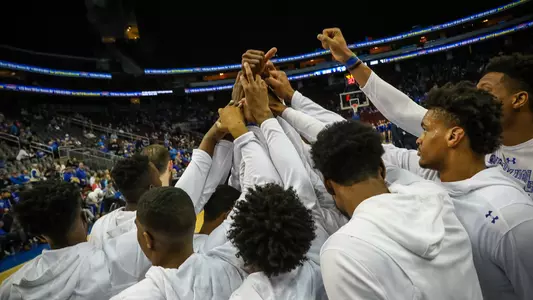Men's Basketball Huddle Prior to Xavier