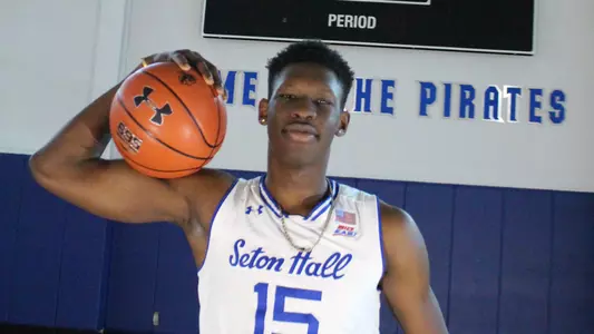 Tyrese Samuel Holding a Basketball