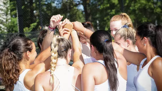 Tennis Team Huddle