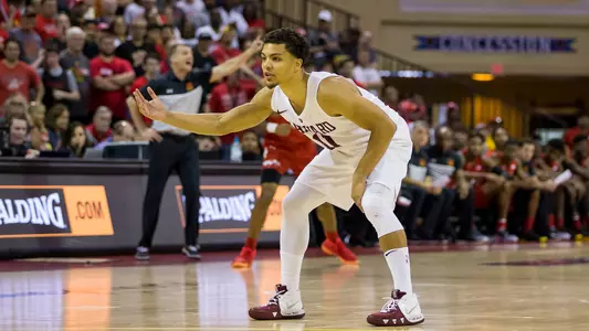 Bryce Aiken in a Harvard uniform
