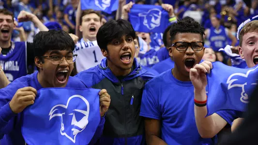Excited Fans at Prudential Center During Rutgers Game