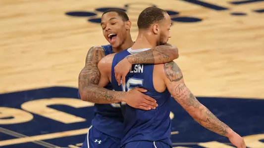 Mar 11, 2021; New York, NY, USA; Seton Hall Pirates guard Shavar Reynolds (33) hugs guard Takal Molson (15) after defeating the St. John Red Storm in overtime of a Big East tournament game at Madison Square Garden. Mandatory Credit: Brad Penner-USA TODAY Sports