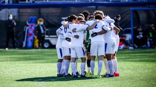 Men's Soccer Team Huddle Before Providence