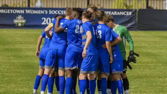 Men's Soccer Huddle vs Marquette