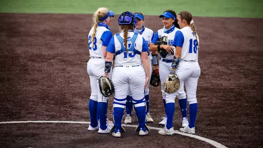 Softball Team Huddle vs Stony Brook