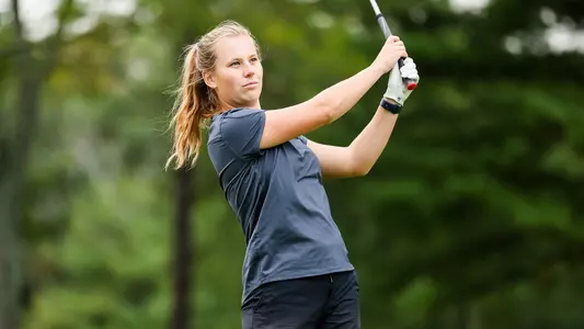 Sarah Fouratt tees of during a practice round during photo day in 2022.