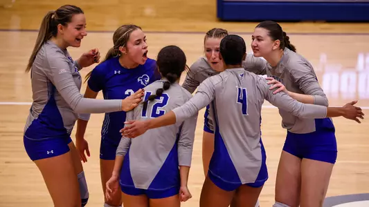 Seton Hall Women's Volleyball Team celebrate a point against UConn on Sept. 23.