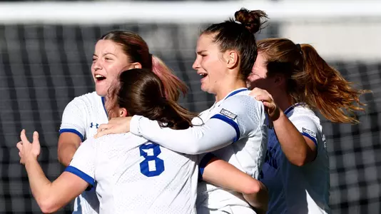 Team celebrates against Butler