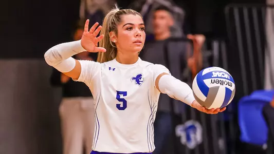 Jennifer Giron serves during a match against UConn on Sept. 23.