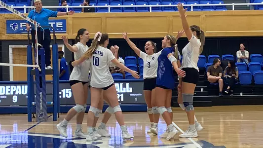 Seton Hall Women's Volleyball Team celebrates a point against DePaul.