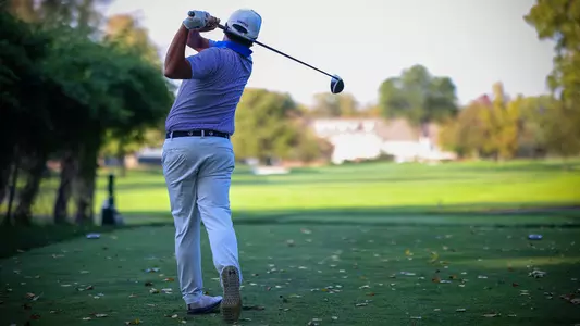 Angus O'Brien tees off at Fiddler's Elbow during a practice round in 2001.