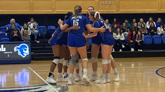 Seton Hall Women's Volleyball Team chats after a Marquette point on Oct. 8.