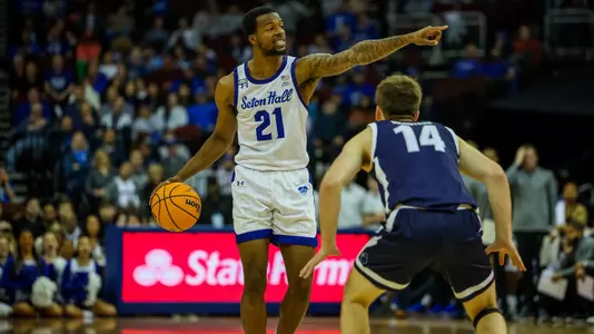 Femi Odukale dribbles vs. Monmouth