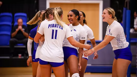 Seton Hall Women's Volleyball Team celebrate a point against UConn on Sept. 23.