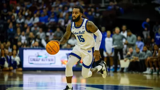 Jamir Harris dribbling against Saint Peter's