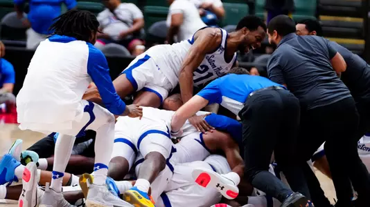 Nov 24, 2022; Orlando, Florida, USA; Seton Hall Pirates players and staff celebrate winning against the Memphis Tigers at ESPN Wide World of Sports. Mandatory Credit: Rich Storry-USA TODAY Sports