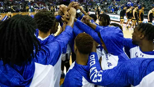 Group huddle pregame vs. Wagner
