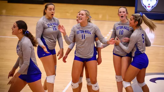 Seton Hall Women's Volleyball Team celebrate a point against UConn on Sept. 23.