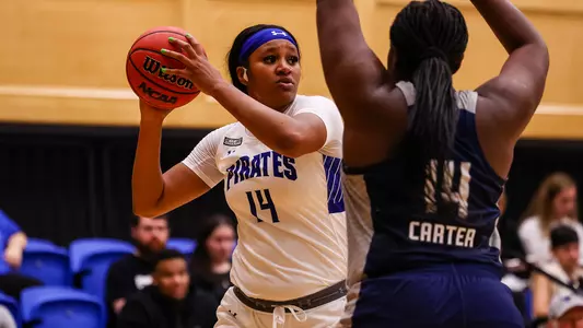 Sidney Cooks looks to pass the ball against Saint Peter's on Nov. 7.
