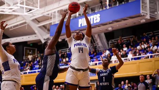 Sidney Cooks powers her way inside against Saint Peter's on Nov. 7