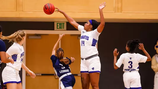 Sidney Cooks blocks a shot against Saint Peter's on Nov. 7