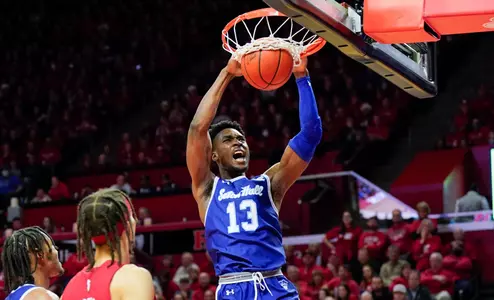 KC Ndefo dunks the ball at Rutgers