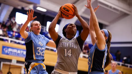 Sidney Cooks battles for a basket against Marquette on Dec. 4