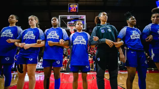 Seton Hall Women's Basketball lines up for the national anthem at Rutgers on Nov. 11.