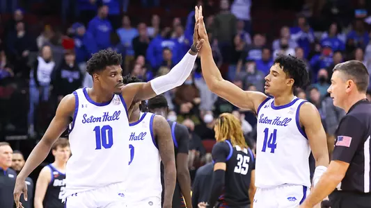 Alexis Yetna High Fives Jared Rhoden vs. DePaul