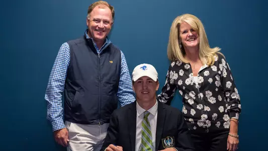 The Ramee Family poses while Hunter Ramee signs his NLI to go to Seton Hall.