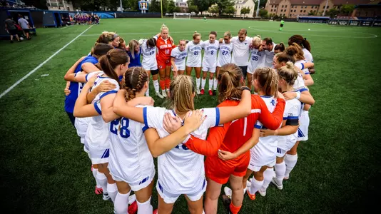 Team huddle before NJIT