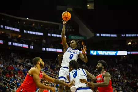 Kadary RIchmond shoots a floater against St. John's