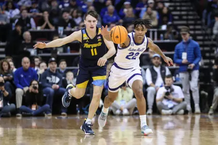Tae Davis comes up with a steal against Marquette