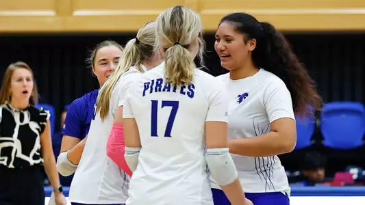 Seton Hall volleyball team huddles after a point against DePaul on Oct. 14