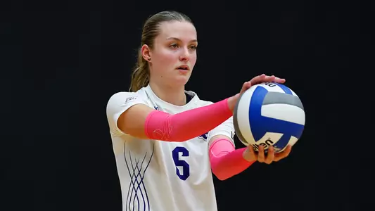 Madeline Matheny gets set to serve against DePaul on Oct. 14.
