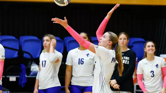 Madeline Matheny serves during Seton Hall's match against DePaul on Oct. 14.