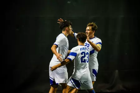 Jared Smith, Mark Walier and Ralph Pascarella celebrating a goal