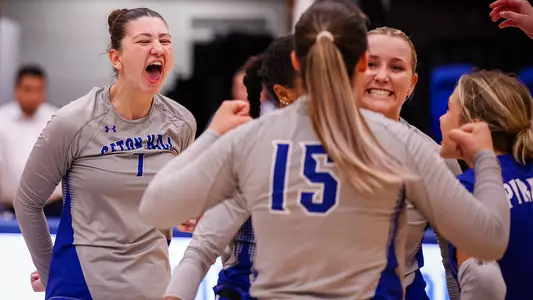 Asli Subasili and teammates celebrate a point against NJIT on Aug. 31