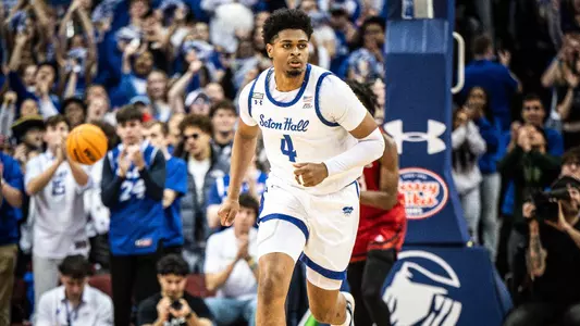 Elijah Hutchins-Everett runs up the floor against Rutgers