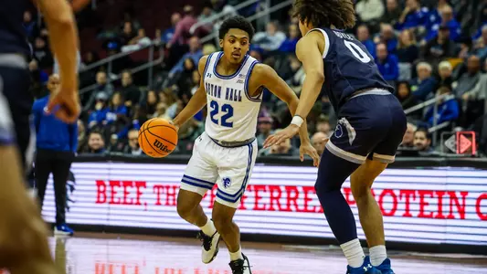 Malachi Brown handles the ball against Monmouth