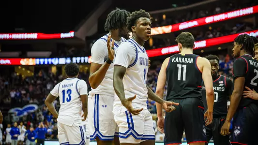 Kadary Richmond reacts after making a basket against UConn