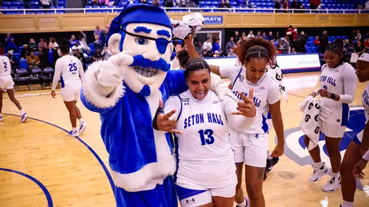 Kae Satterfield parties with the Pirate after Seton Hall's victory over UNLV on Dec. 16