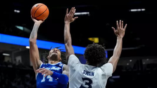 Dre Davis goes for a layup at Xavier