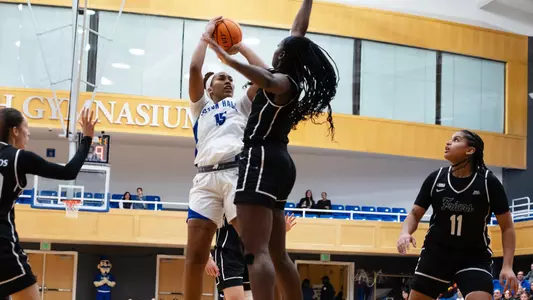 Azana Baines rises for a shot against Providence on Dec. 30