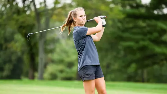 Sarah Fouratt hits her second shot during a practice round