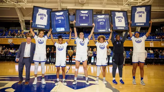 Seton Hall WBB Seniors raise their plaques during a Senior Day ceremony on Feb. 18