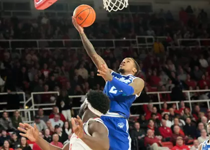 Al-Amir goes to the rim at St. John's