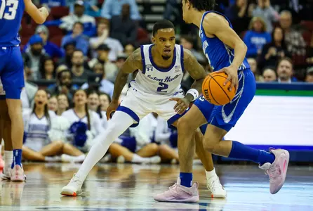 Al-Amir Dawes defends against Creighton