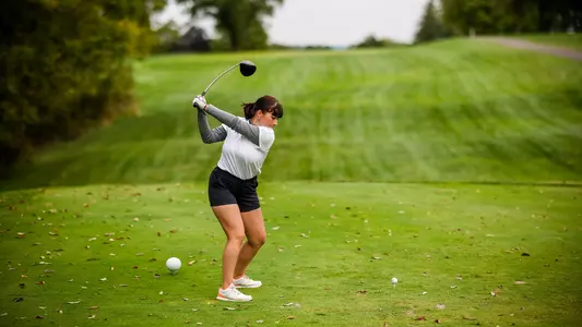 Ludovica Busetto tees off during a practice round in 2022